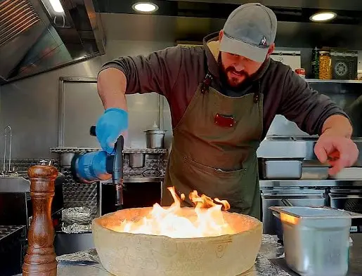flambage de la meule de parmesan